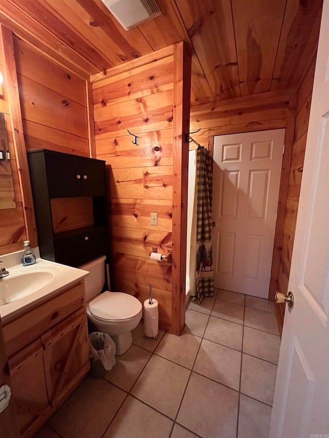 bathroom featuring wood walls and wooden ceiling