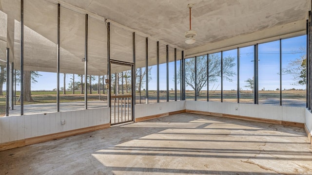 unfurnished sunroom featuring plenty of natural light