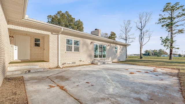 rear view of property with a patio