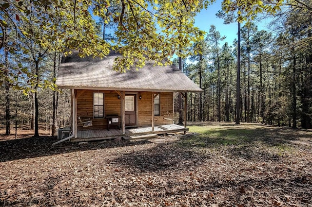 view of front of home featuring central AC and a deck