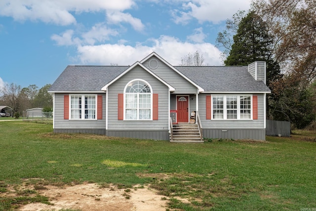 view of front facade featuring a front yard