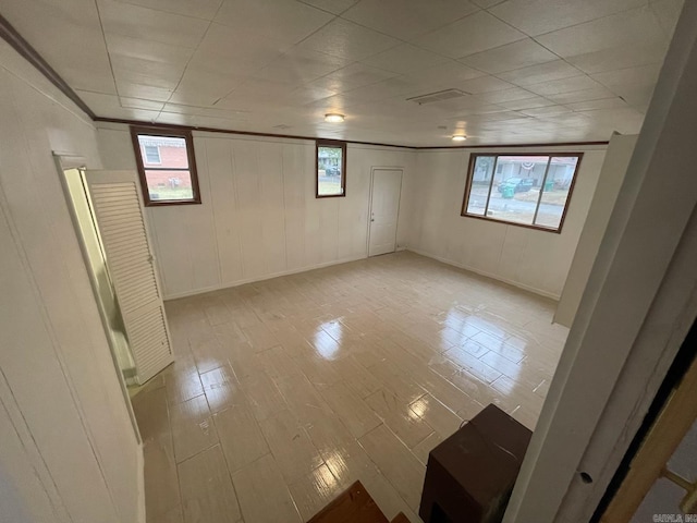 basement featuring light hardwood / wood-style flooring