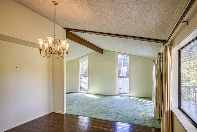 empty room featuring a notable chandelier, lofted ceiling with beams, a textured ceiling, and hardwood / wood-style flooring