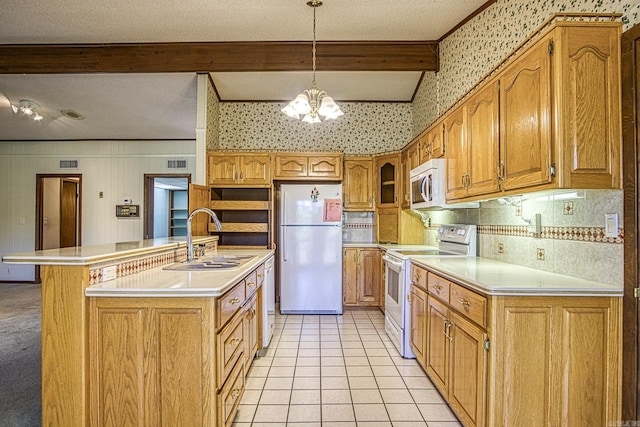 kitchen featuring white appliances, a textured ceiling, a kitchen island with sink, sink, and beam ceiling