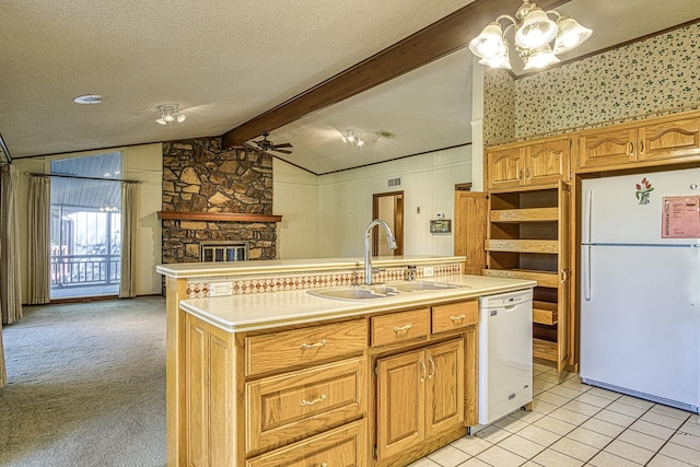 kitchen featuring light carpet, white appliances, a kitchen island with sink, sink, and vaulted ceiling with beams