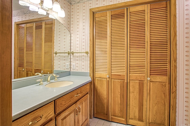 bathroom featuring tile patterned floors and vanity