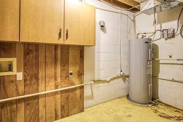 utility room featuring electric water heater