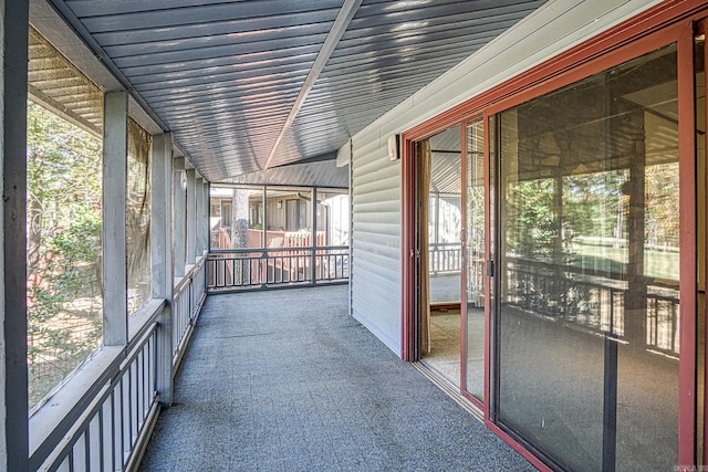 unfurnished sunroom featuring a healthy amount of sunlight