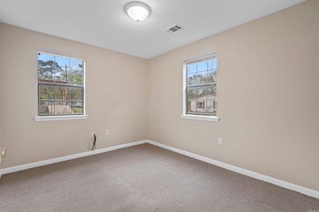 view of carpeted spare room