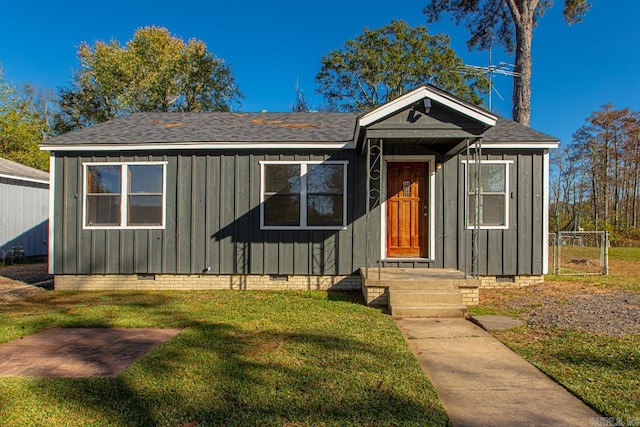 bungalow with a front yard