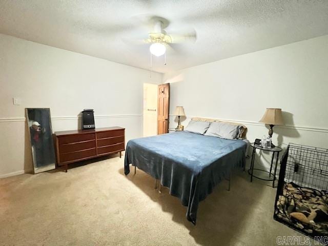 bedroom with ceiling fan, light colored carpet, a textured ceiling, and billiards