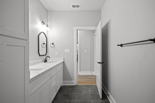 bathroom featuring vanity and tile patterned flooring