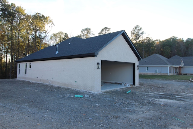 view of home's exterior with a garage