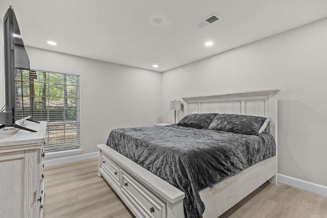 bedroom featuring light wood-type flooring