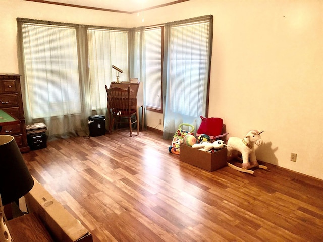2509 Cherry St, Corning, AR 72422 - bedroom with wood finished floors and crown molding