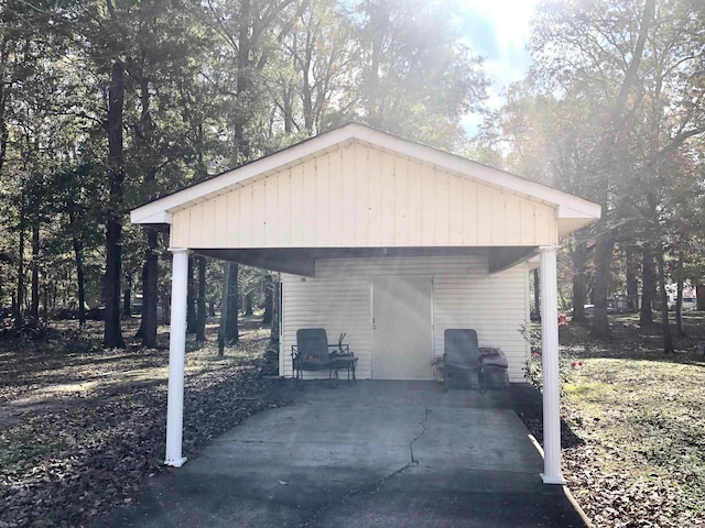 garage featuring a carport