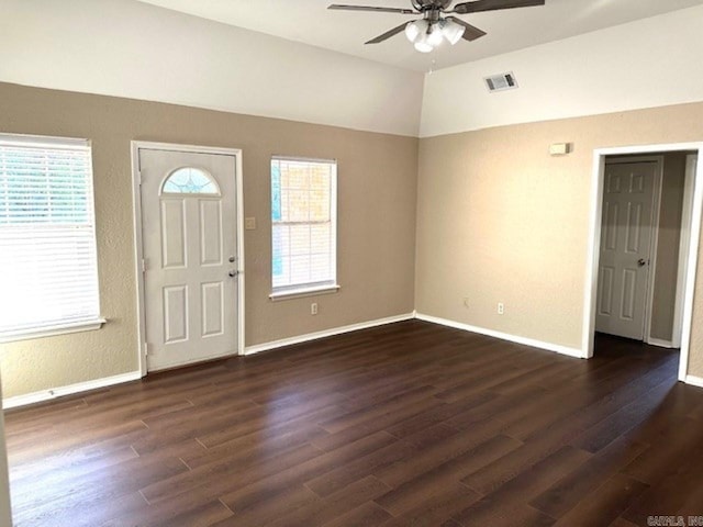 foyer with ceiling fan, dark hardwood / wood-style flooring, and lofted ceiling