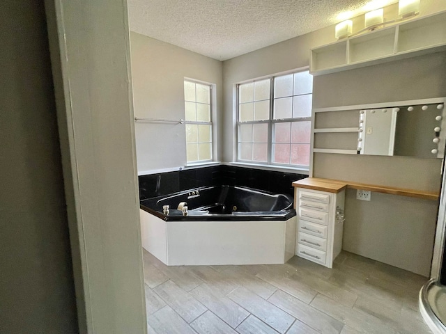 bathroom with shower with separate bathtub, a textured ceiling, and hardwood / wood-style flooring