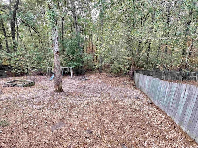 view of yard with a playground