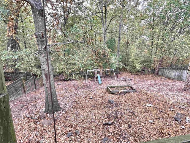 view of yard featuring a playground