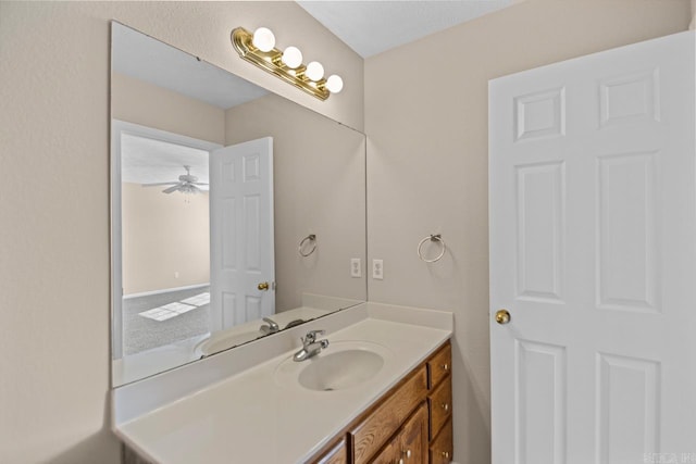 bathroom featuring vanity and ceiling fan