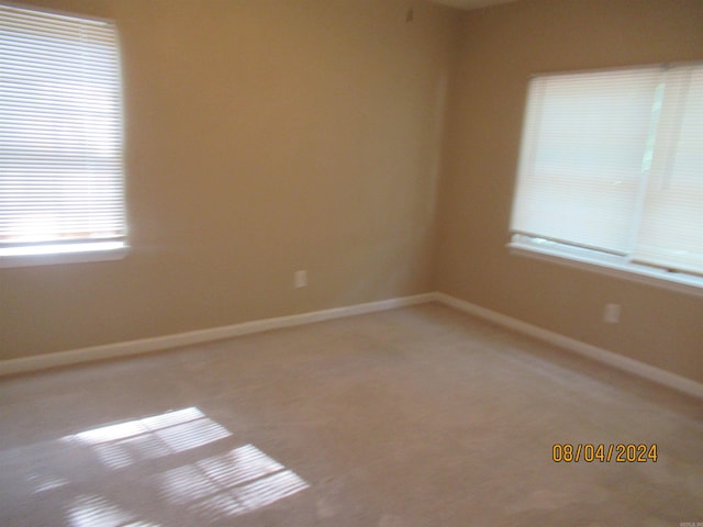 view of carpeted spare room