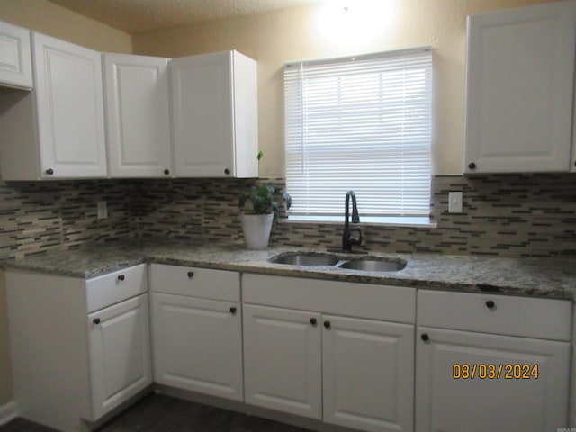 kitchen featuring white cabinetry