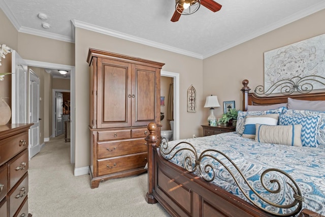 carpeted bedroom featuring ceiling fan, crown molding, and a textured ceiling