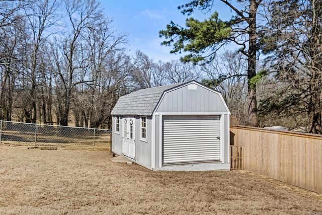 view of shed with a fenced backyard