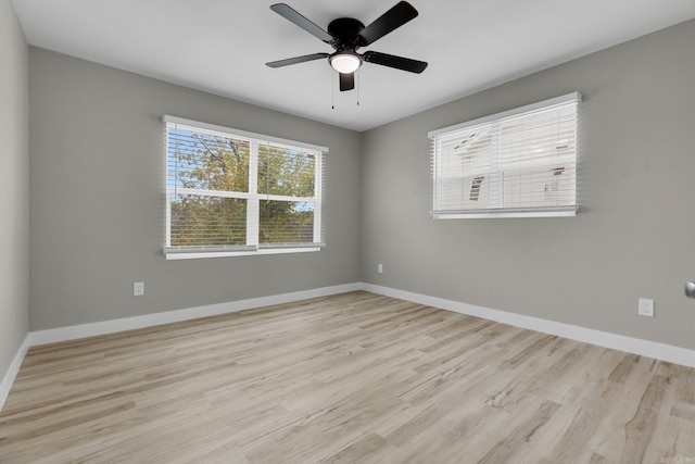 unfurnished room featuring light hardwood / wood-style flooring and ceiling fan