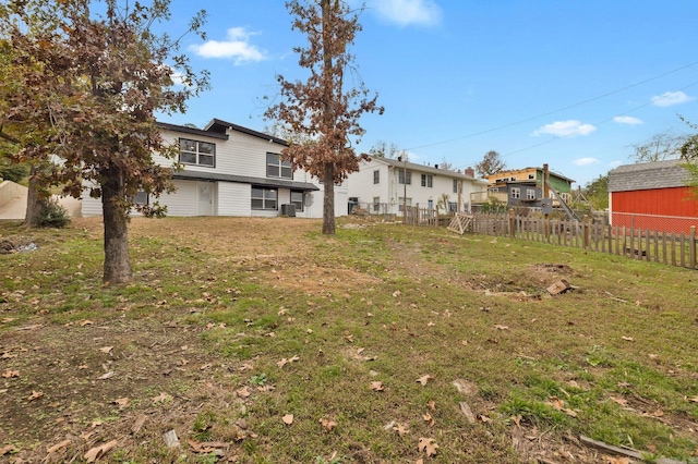 view of yard featuring central air condition unit