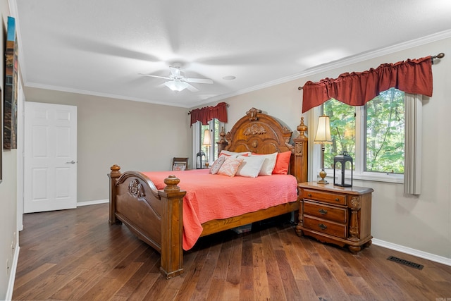 bedroom with ceiling fan, dark hardwood / wood-style flooring, and crown molding