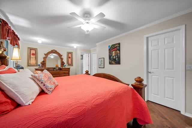 bedroom featuring a textured ceiling, crown molding, ceiling fan, and dark wood-type flooring