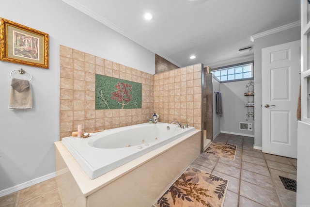 bathroom with a tub to relax in, crown molding, tile patterned flooring, and tile walls