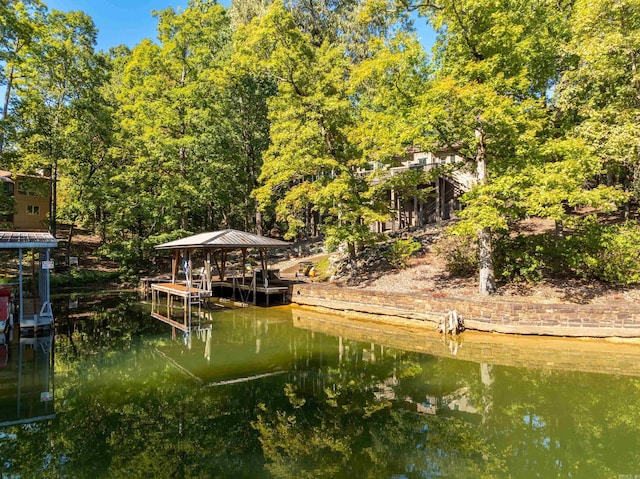 view of dock with a water view