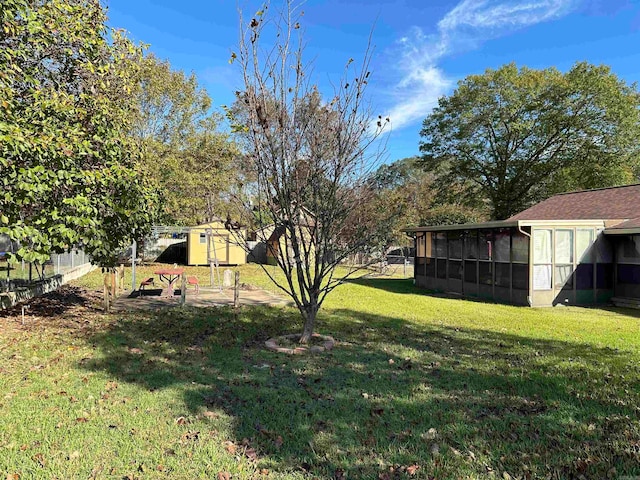 view of yard with a storage shed