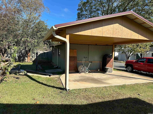 view of side of property with a carport