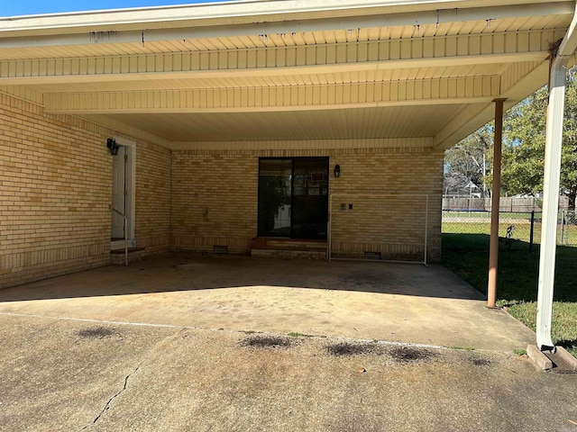 view of patio / terrace with a carport