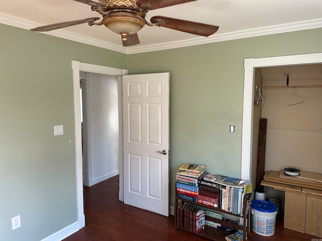 bedroom with a closet, crown molding, ceiling fan, and dark wood-type flooring