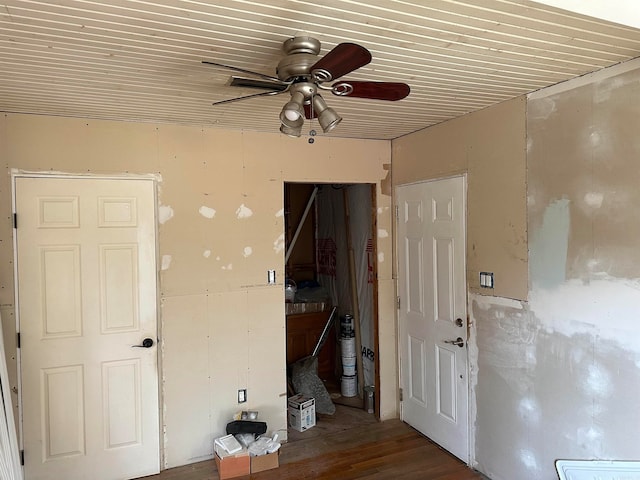 interior space featuring ceiling fan and wood-type flooring