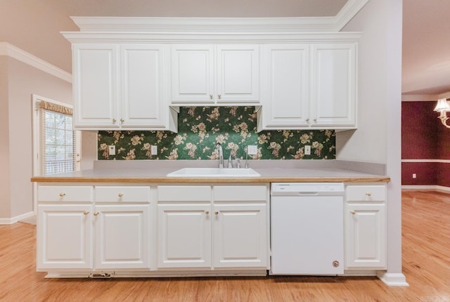 kitchen featuring white dishwasher, light hardwood / wood-style floors, white cabinets, and crown molding