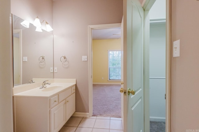 bathroom with tile patterned floors and vanity