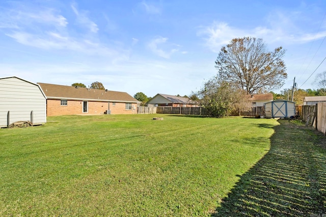 view of yard with a storage shed