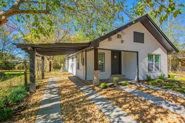 view of front of house featuring a carport