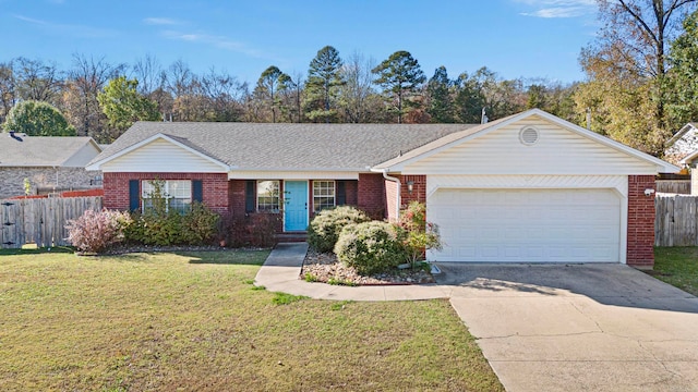 ranch-style home featuring a front lawn and a garage