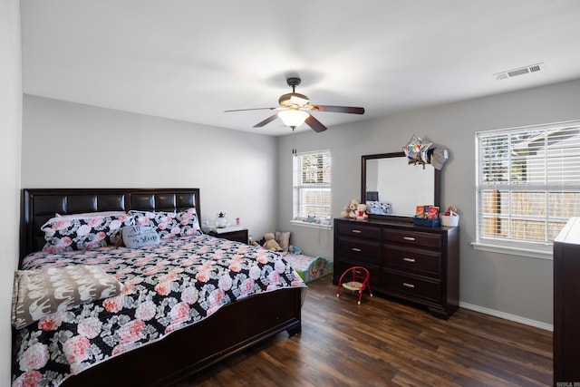 bedroom featuring ceiling fan and dark hardwood / wood-style flooring