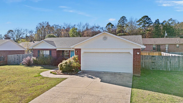 single story home with a garage and a front lawn