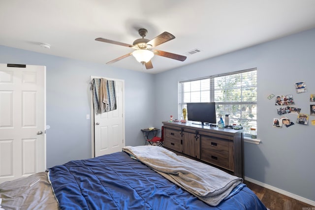 bedroom featuring wood-type flooring and ceiling fan