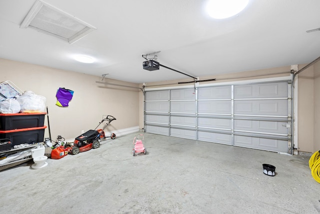 garage featuring a garage door opener