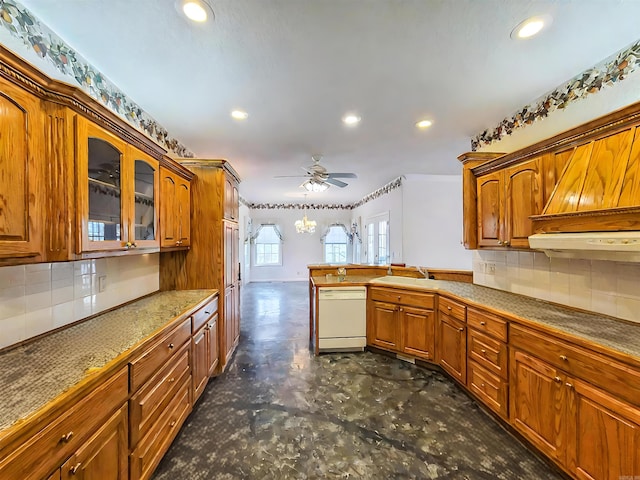 kitchen with dishwasher, sink, backsplash, kitchen peninsula, and ceiling fan with notable chandelier